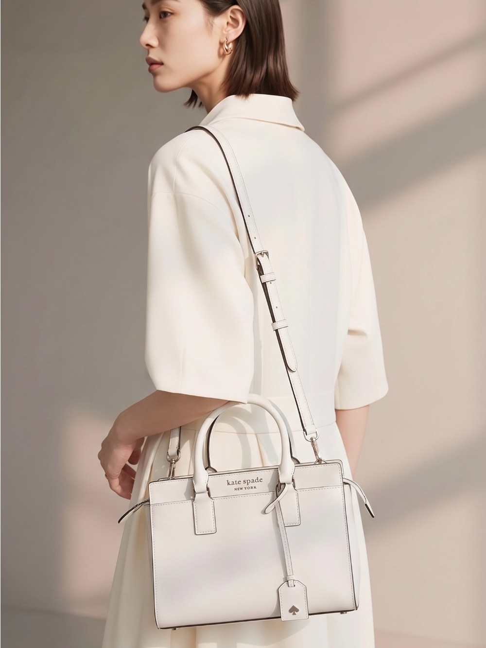 kate spade Cream Leather Satchel with Top Handles and Adjustable Strap